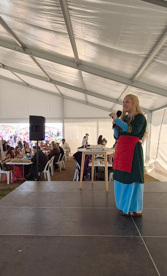 Invited speaker, Megan Formanek, busts common myths of the Viking Age at the Royal Pavillion before hundreds of attendees.
